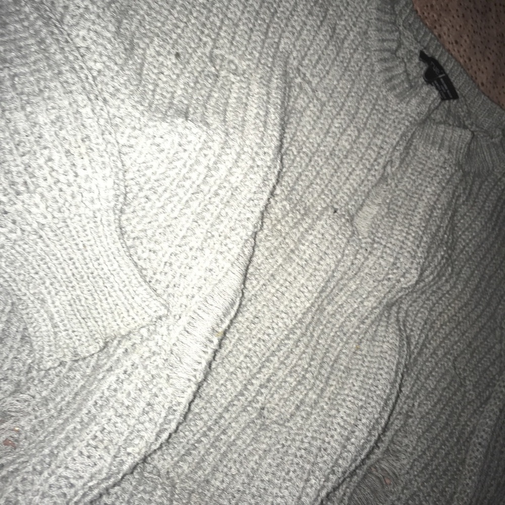 Distressed sweater